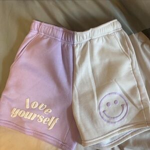 No Boundaries Lavender and White Split Smile Graphic Women's Shorts